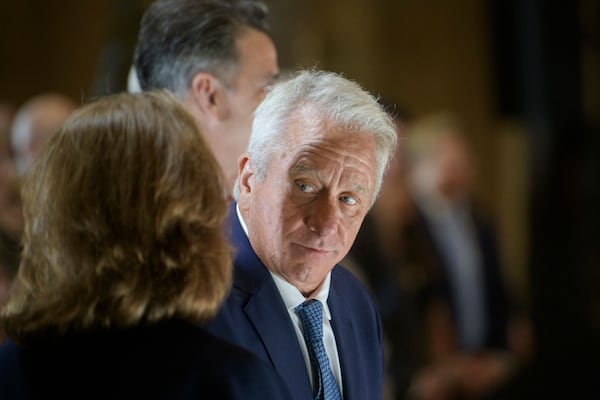 Three-time Tour de France winner Greg LeMond talks with his wife Kathy LeMond before being presented with the Congressional Gold Medal during a ceremony at the Capitol, Wednesday, July 9, 2025, in Washington. (AP Photo/Rod Lamkey, Jr.)