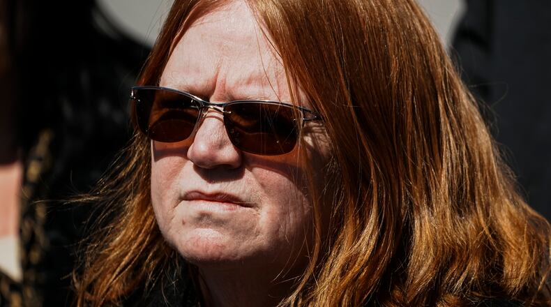 Asa Ellerup, wife, of Rex Heuermann waits to give her statement outside the courthouse as Rex Heuermann, accused in Long Island's infamous Gilgo Beach serial killings, pleaded guilty on Wednesday, April 8, 2026, at Suffolk County Court in Riverhead, New York. (AP Photo/Eduardo Munoz Alvarez)