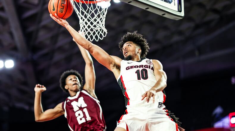 Georgia basketball player Aaron Cook (10), a transfer from Gonzaga, scores on a layup against Morehouse during an exhibition game at Stegeman Coliseum in Athens on Friday, Nov. 3, 2021. (Photo by Tony Walsh/UGA Athletics)