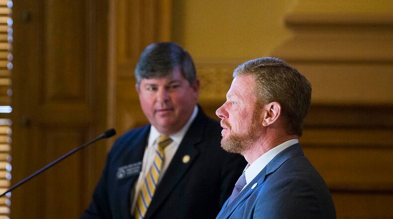 Gov. Nathan Deal’s chief of staff, Chris Riley, answers questions Friday from the Senate Appropriations Committee. (ALYSSA POINTER/ALYSSA.POINTER@AJC.COM)