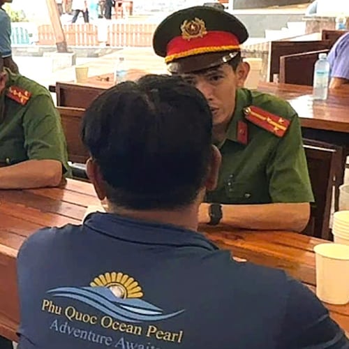 Investigators with crew members involved in the speedboat incident in Phu Quoc, Vietnam, Sunday, July 12, 2026. (VNA/Tran Van Si)
