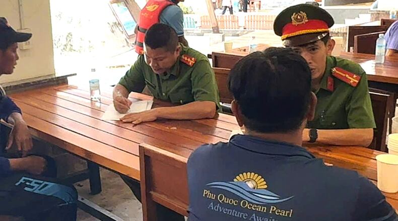 Investigators with crew members involved in the speedboat incident in Phu Quoc, Vietnam, Sunday, July 12, 2026. (VNA/Tran Van Si)