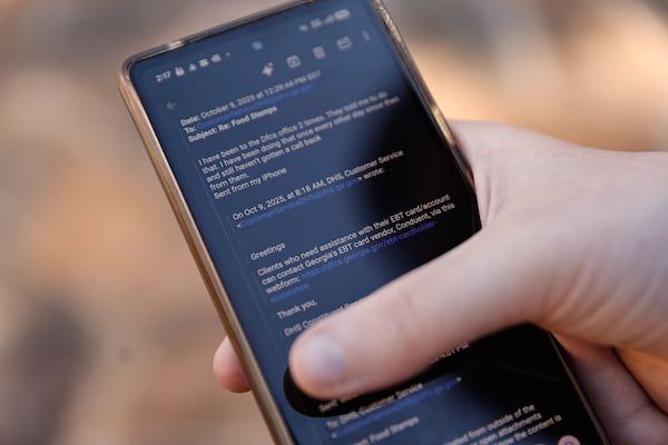 Brooklyn Rouse shares an email correspondence to a Georgia Department of Human Services caseworker regarding her family’s Supplemental Nutrition Assistance Program benefits on Wednesday, Oct. 22, 2025. Her family is among the Georgians who have struggled to access their SNAP benefits after a call center disruption in July. (Natrice Miller/AJC)