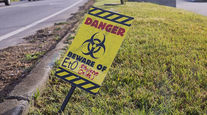 A protest sign placed near the Sterigenics plant warns individuals of ethylene oxide pollution in Smyrna on August 2, 2019. Georgia Health News and WebMD broke the story about industrial plants in Cobb and Newton counties releasing ethylene oxide, a known carcinogen. (Alyssa Pointer/alyssa.pointer@ajc.com)