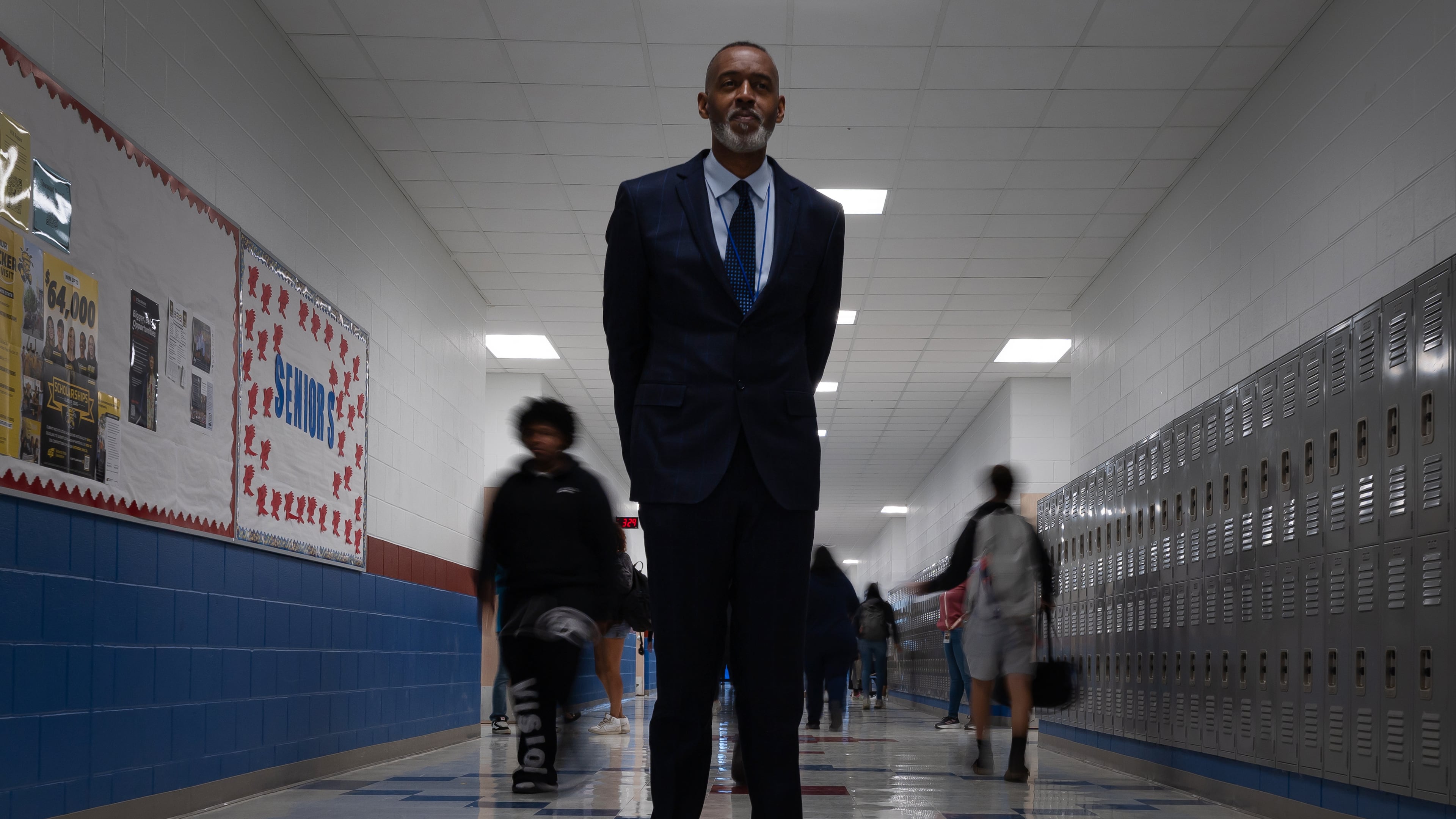 Lackland Independent School District Superintendent Dr. Burnie Roper stands in a hallway at the Virginia Allred Stacey Jr./Sr. High School Monday, Nov. 3, 2025, in San Antonio. (AP Photo/Kin Man Hui)