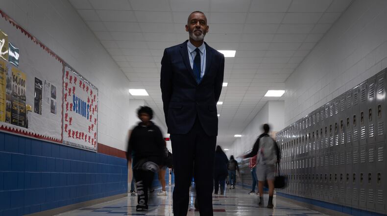 Lackland Independent School District Superintendent Dr. Burnie Roper stands in a hallway at the Virginia Allred Stacey Jr./Sr. High School Monday, Nov. 3, 2025, in San Antonio. (AP Photo/Kin Man Hui)