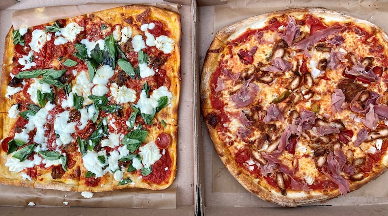 Among the takeout pies available at O4W Pizza in Duluth are the Spicy Italian (left) and the Jersey Shore. Wendell Brock for The Atlanta Journal-Constitution