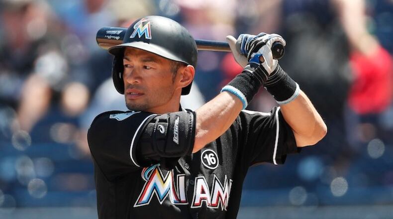 Miami Marlins' Ichiro Suzuki bats against the Houston Astros in the first inning of a spring training baseball game Wednesday, March 29, 2017, in West Palm Beach, Fla. (AP Photo/John Bazemore)