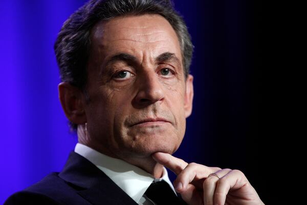 FILE - Former French President Nicolas Sarkozy attends a meeting in Asnieres, outside Paris, March 24 2015. (AP Photo/Thibault Camus, File)