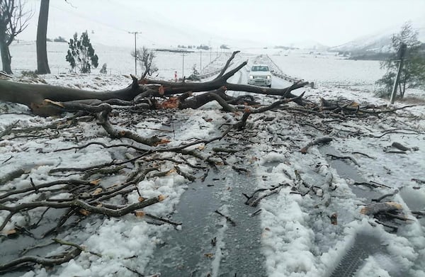Snow covers the N2 road heading to Nolangeni, South Africa, Tuesday, June 10, 2025. (Greater Kokstad Municipality via AP)
