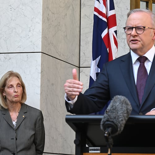 Jillian Siegel, Special Envoy to Combat Antisemitism in Australia listens to Prime Minister Anthony Albanese speak to the media during a press conference at Parliament House in Canberra, Australia, Thursday, Jan. 8, 2026. (Lukas Coch/AAP Image via AP)