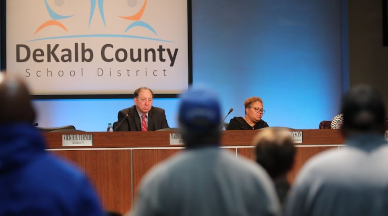 DeKalb County Board of Education Chairman Marshall Orson and Superintendent Ramona Tyson watch a speaker during a public meeting on February 10, 2020 at DeKalb County School District headquarters. (AJC FILE PHOTO)