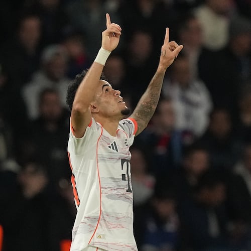 Bayern's Luis Diaz celebrates after scoring his side's second goal during the Champions League opening phase soccer match between Paris Saint-Germain and Bayern Munich in Paris, France, Tuesday, Nov. 4, 2025. (AP Photo/Thibault Camus)