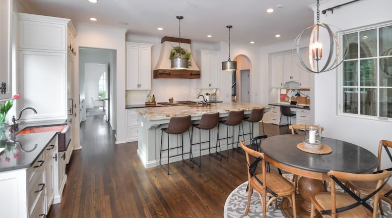 The home is located near an 18-hole golf course and the Brookhaven Country Club.