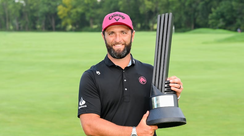 LIV Golf season-long champion captain Jon Rahm, of Legion XIII, poses with the trophy after the final round of LIV Golf Indianapolis, Sunday, Aug. 23, 2026, in Westfield, Ind. (Montana Pritchard/LIV Golf via AP)