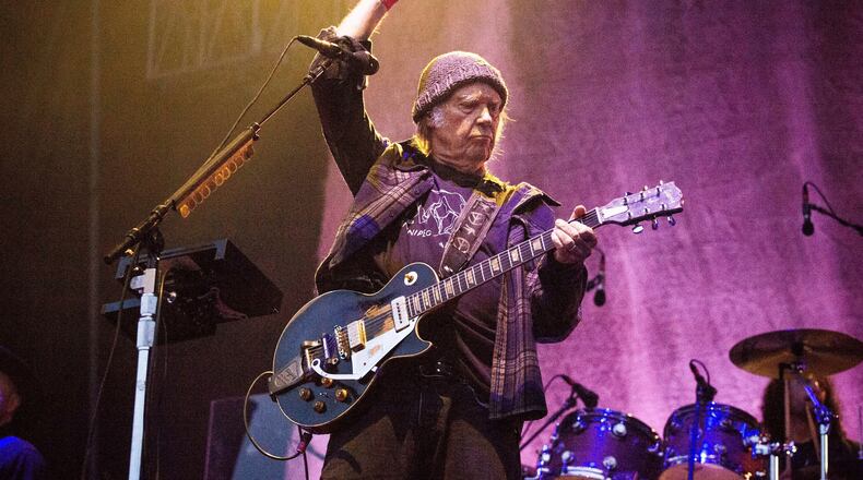 FILE - Neil Young performs at the BottleRock Napa Valley Music Festival in Napa, Calif., on May 25, 2019. (Photo by Amy Harris/Invision/AP, File)
