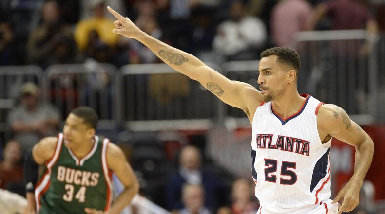 Atlanta Hawks’ Thabo Sefolosha (25) reacts to his 3-point basket against the Milwaukee Bucks in the second half of an NBA basketball game Monday, March 30, 2015, in Atlanta. Atlanta won 101-88. (AP Photo/David Tulis)