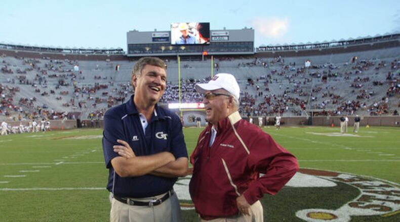 Georgia Tech coach Paul Johnson visits with Florida State coach Bobby Bowden before Saturday night's game in Tallahassee.