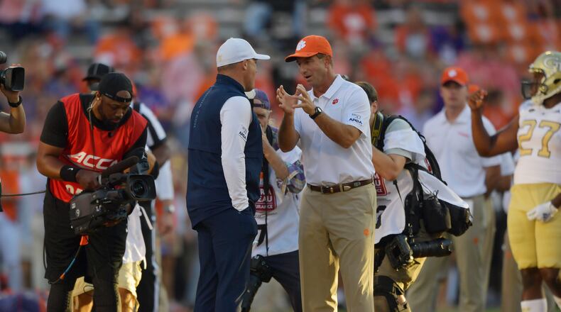 Clemson coach Dabo Swinney (right) chats with Georgia Tech coach Geoff Collins before a 2019 game. (Hyosub Shin / Hyosub.Shin@ajc.com)