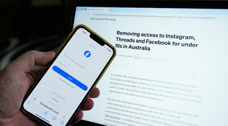 FILE - A logon screen for Facebook and the new Meta policy are photographed in Sydney, Australia, on Nov. 20, 2025. (AP Photo/Rick Rycroft, File)