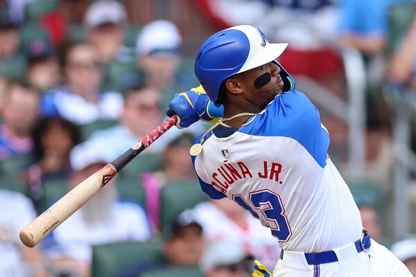 Atlanta Braves' Ronald Acuna Jr. hits a two-run home run in the sixth inning of a baseball game against the San Diego Padres, Saturday, May 24, 2025, in Atlanta. (AP Photo/Colin Hubbard)
