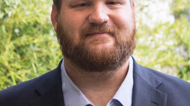 Mike Lewis, the sole candidate for Travis County Democratic Party chair, announced Thursday he is pulling out the race over “careless words and posts” he made on Facebook in years past.
