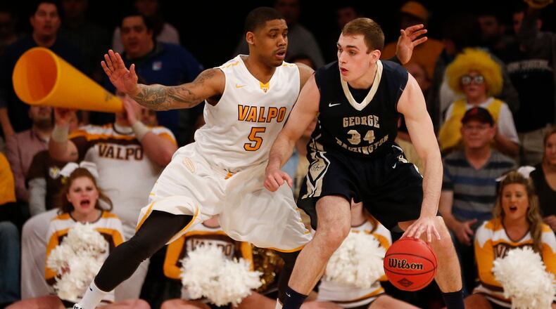 Darien Walker of the Valparaiso Crusaders guards Tyler Cavanaugh of the George Washington Colonials during their NIT Championship game at Madison Square Garden on March 31, 2016 in New York City. (Photo by Jeff Zelevansky/Getty Images)