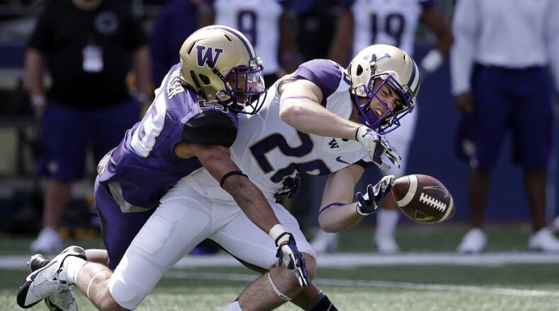 Washington cornerback Jordan Miller, left. making a play in practice.(Associated Press)