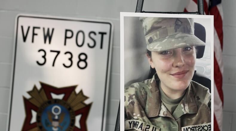 A photo is displayed of National Guard member Specialist Sarah Beckstrom, one of two National Guard members who were shot in Washington on Wednesday, in Webster Springs, W.Va., Friday, Nov. 28, 2025. (AP Photo/Kathleen Batten)