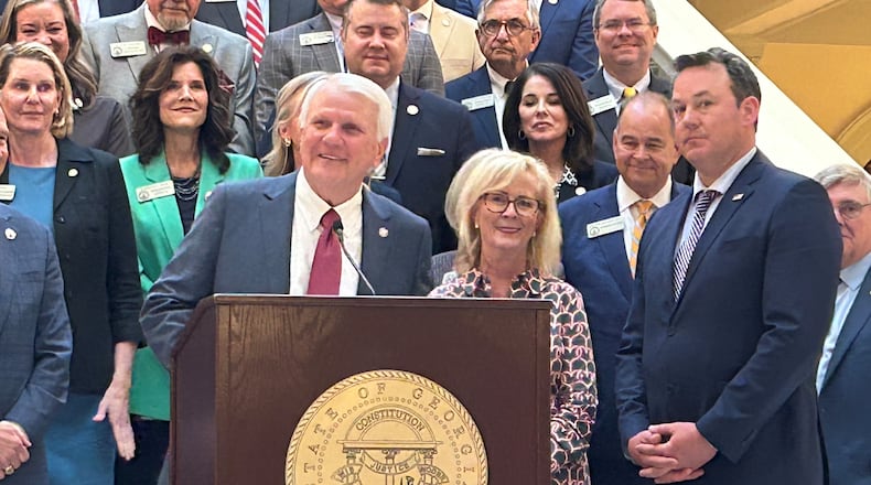 House Speaker Jon Burns (left) and Lt. Gov. Burt Jones celebrate Tuesday's passage of House Bill 1193, which seeks to improve literacy among Georgia schoolchildren. (David Wickert/AJC)
