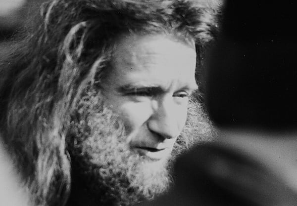 Actor Robin Williams takes a break from a make-up session to speak with locals watching the filming of Jumanji on Nov. 15, 1994 in Keene, N.H. (Maureen E. McHugh via AP File)
