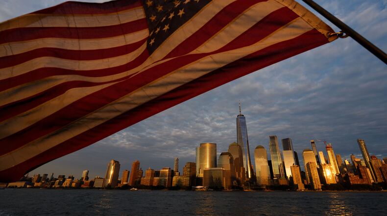 An American flag flies, with the lower Manhattan skyline in background, Wednesday, Sept. 9, 2026, in Jersey City, NJ. (AP Photo/Adam Gray)
