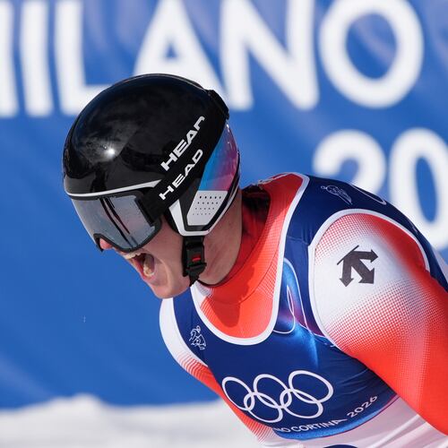 Switzerland's Franjo von Allmen celebrates at the finish area of an alpine ski men's downhill race, at the 2026 Winter Olympics, in Bormio, Italy, Saturday, Feb. 7, 2026. (AP Photo/Rebecca Blackwell)