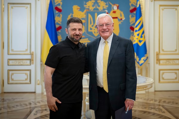 Ukrainian President Volodymyr Zelenskyy, left, and United States Special Envoy for Ukraine and Russia, Joseph Keith Kellogg pose for a photo in Kyiv, Ukraine, Monday, July 14, 2025. (Ukrainian Presidential Press Office via AP)