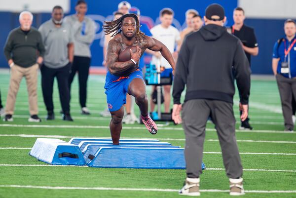Boise State's Ashton Jeanty runs a drill during the school’s NFL football pro day held, Wednesday March 26, 2025, at the Caven-Williams Indoor Facility in Boise, Idaho. (AP Photo/Kyle Green)