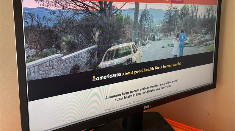 Americares' website sits open on a computer monitor in New York on Tuesday, Sept. 8, 2026. (AP Photo/James Pollard)