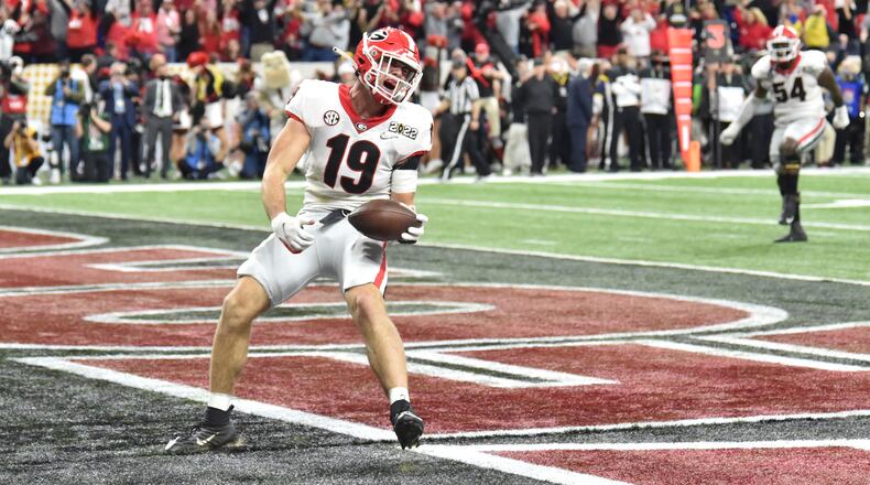 Georgia tight end Brock Bowers reacts after scoring a touchdown in the 4th quarter during the 2022 College Football Playoff National Championship Game at Lucas Oil Stadium in Indianapolis on Monday, January 10, 2022. (Hyosub Shin / Hyosub.Shin@ajc.com)