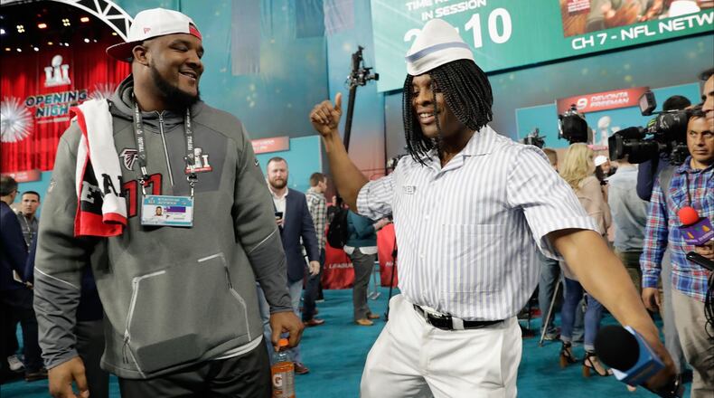'Ed' of Good Burger interviews Ra'Shede Hageman #77 of the Atlanta Falcons during Super Bowl 51 Opening Night at Minute Maid Park on January 30, 2017 in Houston, Texas.