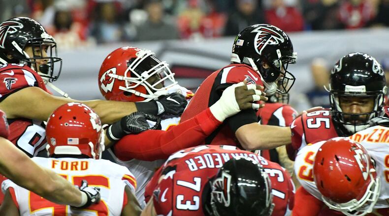 December 4, 2016 Atlanta - Atlanta Falcons quarterback Matt Ryan (2) is unable to get off a pass as he is brought down by Kansas City Chiefs outside linebacker Tamba Hali (91) during the second half in an NFL football game at the Georgia Dome on Sunday, December 4, 2016. Kansas City Chiefs won 29 - 28 over the Atlanta Falcons. HYOSUB SHIN / HSHIN@AJC.COM