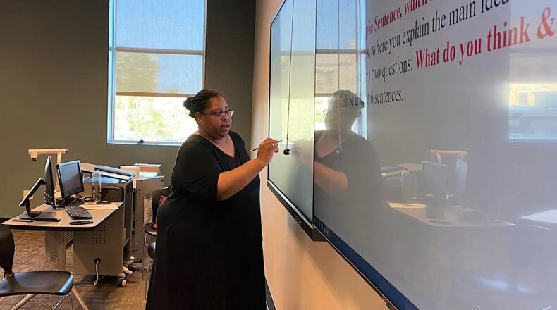 Ivy Tech Community College overhauled remedial education over the last decade. Leaders said the changes have helped substantially more students graduate on time. Tiffani Butler is teaching English 111, which is required for many students, in Indianapolis. Courtesy of Dylan Peers McCoy/WFYI