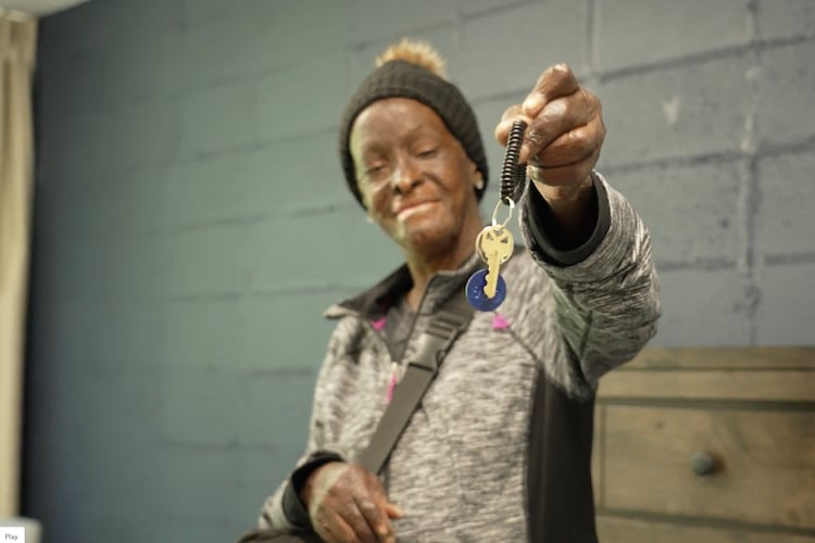 Partners for HOME client receives housing assistance and essential support services. (Courtesy)