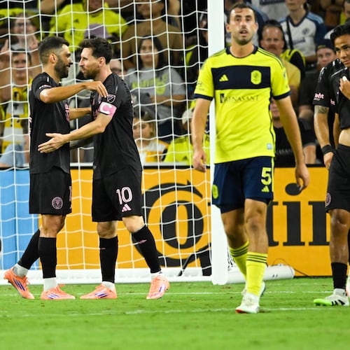 Inter Miami forward Lionel Messi (10) celebrates his goal with defender Jordi Alba, second from left, as Nashville SC midfielder Gastón Brugman (7) and defender Jack Maher (5) walk away during the second half of a MLS soccer match Saturday, Oct. 28, 2025, in Nashville, Tenn. (AP Photo/John Amis)