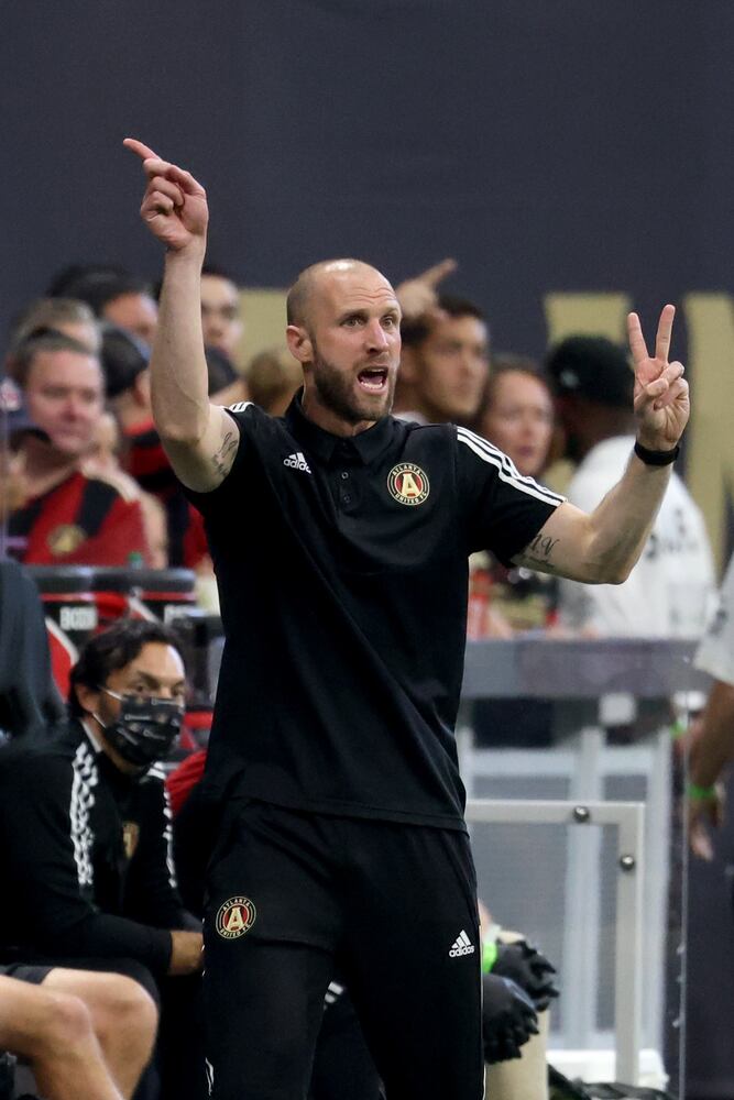Atlanta United Interim coach Rob Valentino coaches from the bench during the first half against the Columbus Crew at Mercedes-Benz Stadium Saturday, July 24, 2021 in Atlanta. JASON GETZ FOR THE ATLANTA JOURNAL-CONSTITUTION