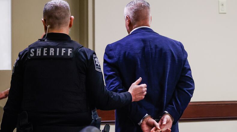 Colin Gray, the father of Apalachee High School shooting suspect Colt Gray, is handcuffed and escorted out of the room after jury deliberations at his trial at Barrow County Courthouse in Winder, on Tuesday, March 3, 2026. (Abbey Cutrer/AJC)