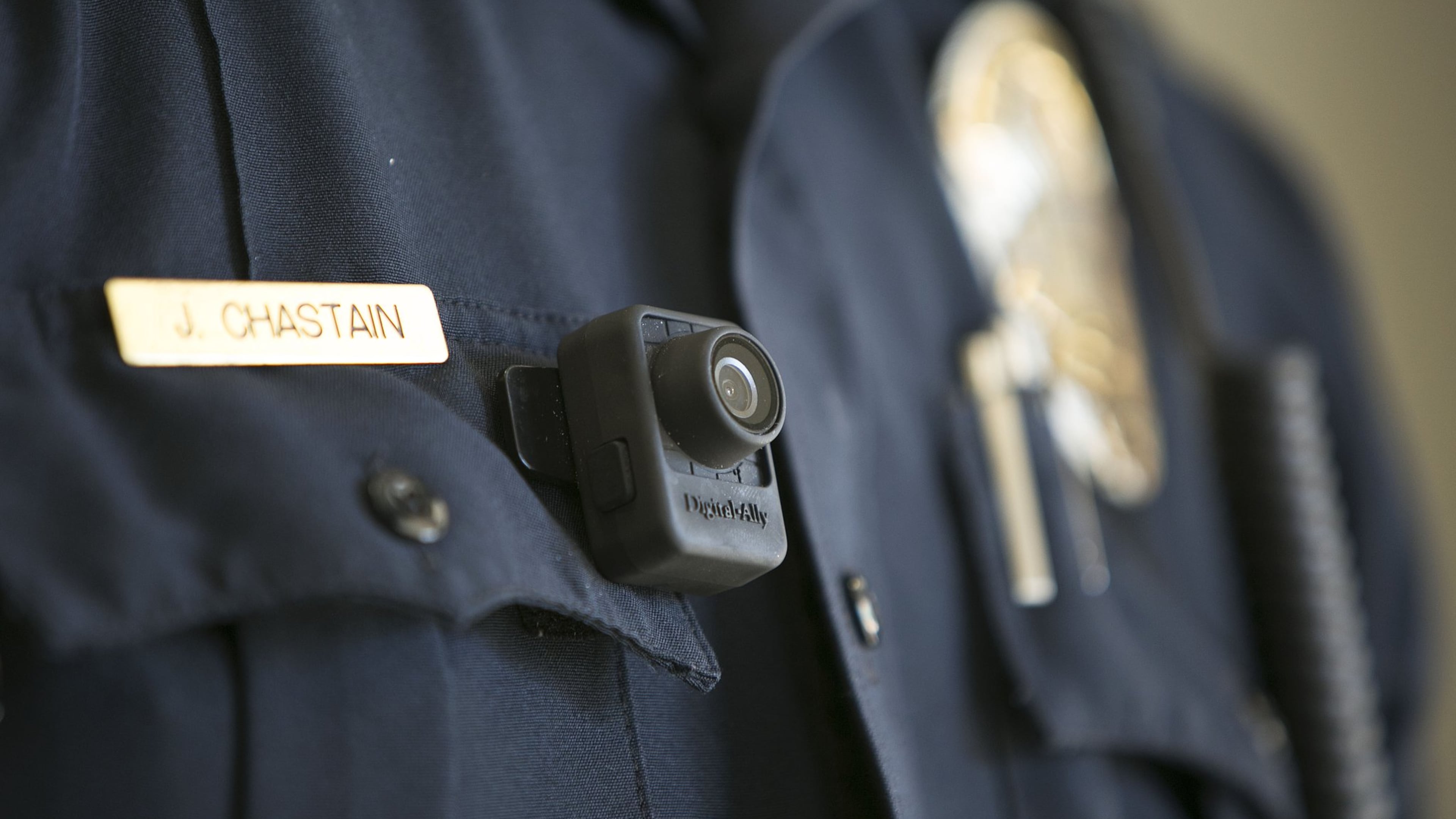 APD officers started wearing body cams in late 2016. (AJC File)