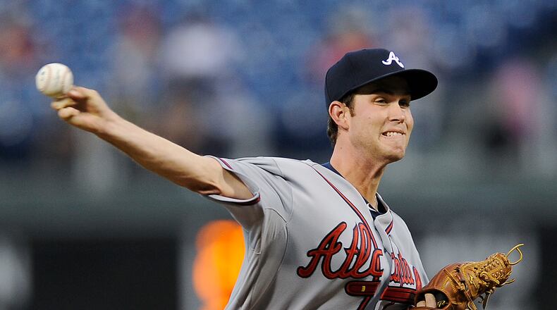 Atlanta Braves starting pitcher Ryan Weber throws in the first inning of a baseball game against the Philadelphia Phillies, Tuesday, Sept. 8, 2015, in Philadelphia. (AP Photo/Michael Perez)