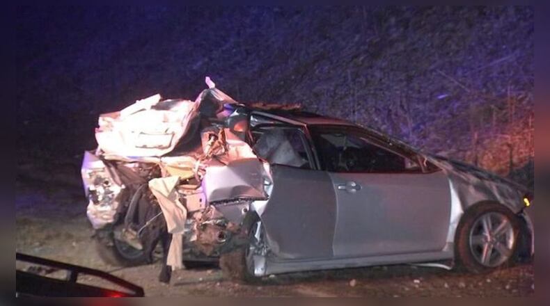 A car was left with no back end after a train slammed into it, Cobb County police said.