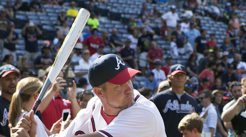 AUGUST 8, 2015-ATLANTA: Chipper Jones take batting practice before a softball game with the 1995 Braves team against other Braves alumni at Turner Field in Atlanta on Saturday August 8th, 2015. (Photo by Phil Skinner)