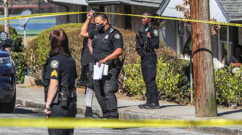 March 21, 2022 Atlanta: A 15-year-old boy was shot Monday morning, March 21, 2022 at a southwest Atlanta apartment complex, police said. The shooting happened around 10:30 a.m. at Oakland City West End apartments in the 1100 block of Oakland Lane. The teen was shot in the arm and the bullet went into his stomach after two men in a white Kia pulled up next to him, Sgt. Michael Young with the Atlanta police aggravated assault unit said. ÒThe gentleman was outside with his friends hanging out when a white vehicle, a Kia, pulled up, asked him a question, then an argument ensued and then (someone in) the white Kia shot the young man,Ó Young said. The teen, who is from Clayton County, was taken to Grady Memorial Hospital and is in surgery in critical condition, Young said. Police do not know what the shooter asked the teen or if the two suspects knew the victim. Minnie Pearl, who has lived at the apartment complex for six years, said she called 911 as soon as she heard a gunshot and spotted the bleeding victim. ÒI heard a shot and I heard somebody scream,Ó she said. ÒI saw a child, a kid lying on the floor bleeding. And when I walked over, I seen the blood coming from his arm.Ó But Monday morningÕs scene is nothing out of the ordinary for Pearl, who said there was another shooting two weeks ago and that gunshots are background noise. ÒWe go through this every day. We see this every day,Ó Pearl said. ÒThey shoot all throughout the night, the day, broad daylight, 12 oÕclock at night, and it be right there by my window.Ó Another neighbor, Maria Parker, said more security in the area could curb the frequent gun violence, which she says prevents children from being able to play outside. Police did not release any information about the suspects but said they are looking through camera footage in hopes that it caught the incident. Young said authorities are trying to determine if the victim is still in school. MondayÕs victim is one at least six teens shot in metro Atlanta this year. Earlier in March, 16-year-old Joshua Adetunji died after being shot near the Atlanta Fair on its opening weekend. A 14-year-old and 19-year-old were also injured in the incident. In late January, 17-year-old Havord Head was fatally shot at The Commons apartments on Middleton Road. Investigators said they believed the shooting stemmed from a robbery involving narcotics. Earlier that month, 15-year-old Kelvice Roberson Jr. was shot and killed at the Dunbar Neighborhood Center along Windsor Street. (John Spink / John.Spink@ajc.com)