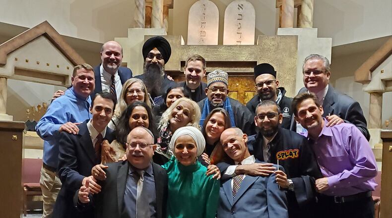 The 14th annual Ecumenical Thanksgiving Celebration in Marietta brought together hundreds of people from different faiths (some are shown here). The event inspired participants to leave a better world for generations to come. Contributed by Shaheen Bharde